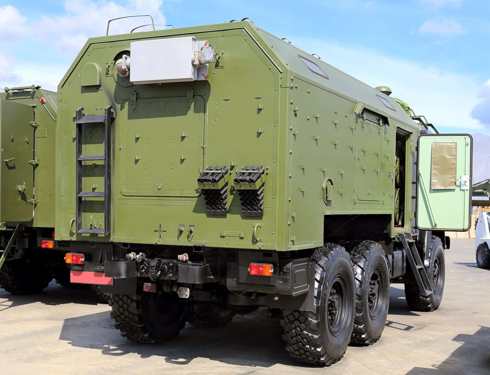 Defense command and staff machine operating in field conditions with advanced interface, showcasing Security Robotics Solutions in action.